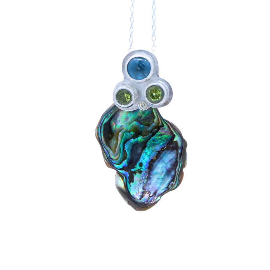 silver pendant with paua shell and kyanite and peridot gemstones