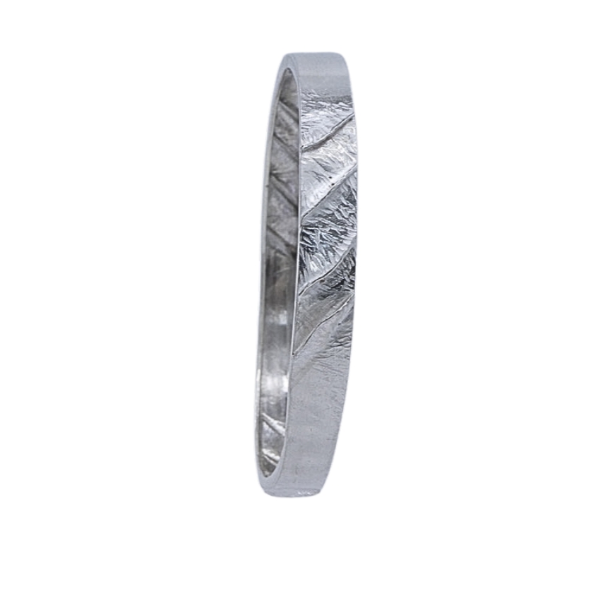 silver bangle with textured ridges