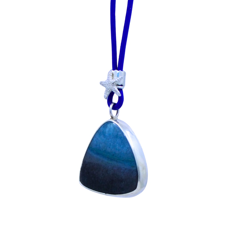 Trolleite pendant on leather thong