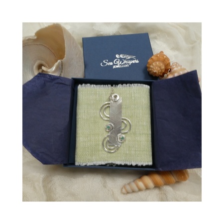 Dark blue jewellery box containing silver jewellery